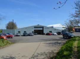 24,000 SQ FT VEHICLE STORAGE/WORKSHOP/ SHOWROOM, SUBSTANTIAL SITE AREA, (EXISTING BUSINESSES NOT AFFECTED) FREEHOLD FOR SALE